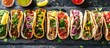 © Ilgun - A lineup of tantalizing Mexican street tacos garnished with veggies, salsa, chicken, beans on a slate, featuring carne asada and al pastor in corn tortillas, against a background of copy space image.