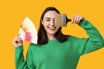 Sticker - Young woman with color palettes and paintbrush on yellow background