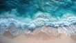 © olegganko - Aerial View of Turquoise Ocean Waves Crashing on Sandy Beach