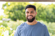 © Wavebreak Media - Smiling man standing outdoors, enjoying sunny day in casual attire