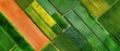 © HDP-STUDIO - Aerial view of vibrant, colorful agricultural fields showcasing different crops and patterns, creating a stunning patchwork landscape.
