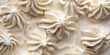 © Ice Cream Paradise - Classic vanilla ice cream swirl, a closeup of classic vanilla ice cream swirls, their creamy texture and soft color against a white background
