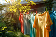 © Dmitry - Colorful laundry drying on a clothesline under a bright blue sky. Perfect for illustrating clean living, home care, and eco-friendly practices