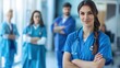© kampret 99 - A group of medical professionals in blue uniform are standing together in a hospital room