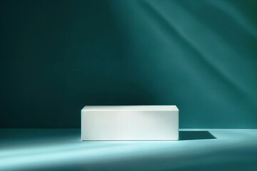 Poster - Minimalist rectangular white block positioned on a teal surface, with a smooth teal backdrop and soft lighting.