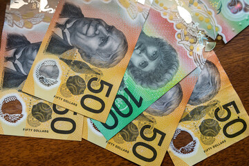 Wall Mural -  new banknotes 50 and 100 Australian dollars money as finance background. AUD