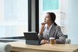 © Prathankarnpap - Shot of an attractive businesswoman touching chin and looking away, thinking of question or idea