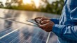 © atipong - A renewable energy engineer assessing solar potential on a digital tablet, close-up on hands analyzing insolation data for solar energy projects