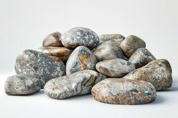 Wall Mural - A close-up shot of a pile of rocks resting on a white surface