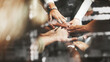 © Rawpixel.com - Joined hands for teamwork
