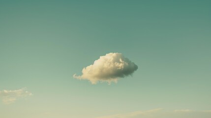 Wall Mural - Daylight sky with a solitary white cloud moving gently