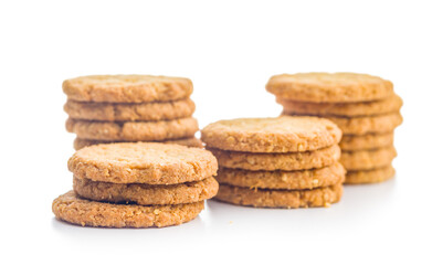 Wall Mural - Tasty oatmeal cookies isolated on white background.