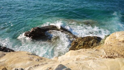 Wall Mural - Sea waves and rock shore  on Greek island Crete.