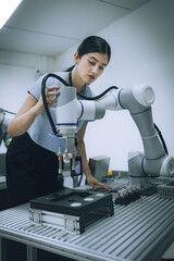 Wall Mural - computer science development engineer working on robotic arm connection control at electronic futuri