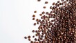 © CStock - Piles of coffee beans on white background.Copy space.