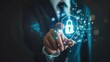 © Silmiart - Businessman in suit touches a glowing padlock icon, symbolizing data security and network protection.
