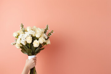 Wall Mural - woman hand holding rose flower bouquet