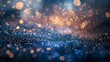 © tinnakorn - Abstract background with bokeh lights in blue and gold tones.