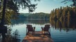 © Anna - A serene lakeside view with calm water, trees, and a wooden dock