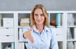 © H_Ko - Businesswoman offer hand to shake as hello in office closeup. Serious business friendly support service excellent prospect introduction or thanks gesture gratitude invite to participate concept