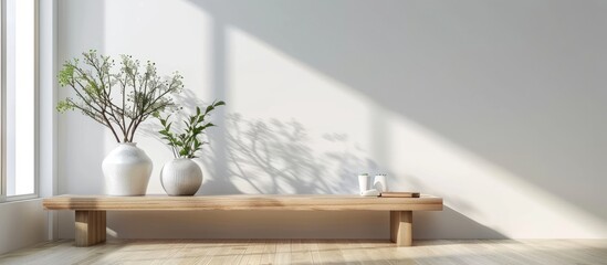 Wall Mural - Ceramic art deco vases and placard arranged on a wooden bench in front of a white wall, suitable for home decoration with a modern touch.