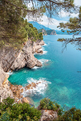 Poster - Beautiful bay in Petrovac, Montenegro, surrounded by mountains, perfect for a summer vacation