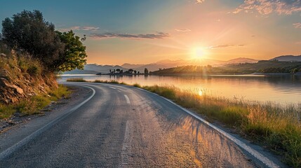 Lake and road at sunset.