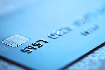 Plastic credit card on table, macro view