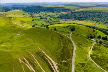 Wall Mural - Aerial view of lush green valleys and small towns (South Wales, UK)