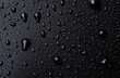 © DigitalCanvas - Water drops on a black metal background