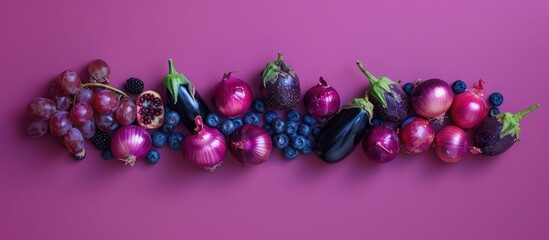 Wall Mural - Arrangement of mangosteens, onions, grapes, plums, blueberries, blackberries, dates, and eggplants on a vibrant purple backdrop. Flat lay photography featuring a unique food and macro concept.