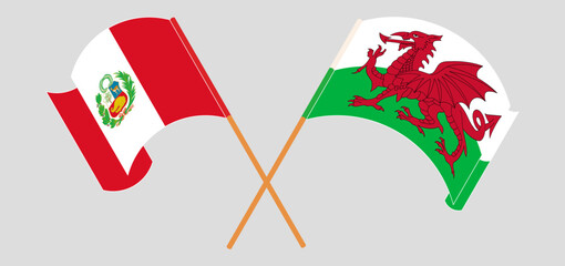 Wall Mural - Crossed and waving flags of Peru and Wales