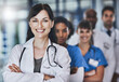 © ClearConcept/peopleimages.com - Portrait, happy woman or confident doctors with teamwork in hospital for healthcare services or about us. Nursing leadership, medical professional and nurses with pride or trust at wellness clinic