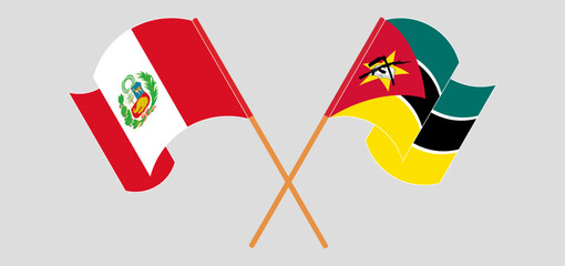 Wall Mural - Crossed and waving flags of Peru and Mozambique