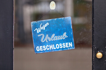 Wall Mural - Closure for holidays - Sign in German