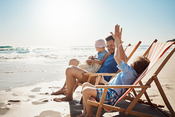 Wall Mural - High five, beach and father with children on chair for holiday, vacation and relax on tropical island. Family, travel and dad with kids by ocean for bonding, playing and fun in nature on weekend