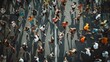 © Prostock-studio - An aerial view of a large group of runners participating in a marathon race. The runners are moving in a single file line, with their shadows cast upon the pavement.