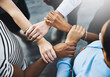 © peopleimages.com - Business, people and holding hands in meeting, unity and deal of merger of company and solidarity. Group, support, agreement and coalition for politics in Germany, government or partnership in office
