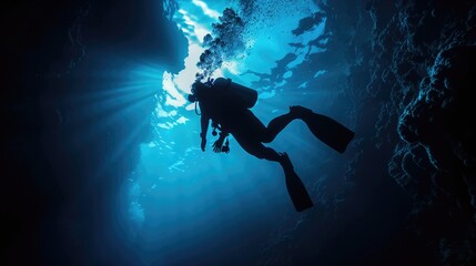 Wall Mural - Diver underwater in the blue sea. Scuba diving in the depths of the sea
