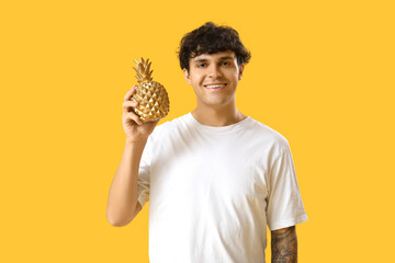 Sticker - Young man with decorative pineapple on yellow background