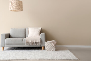 Wall Mural - White living room with cozy sofa, carpet,  lamp and pillow