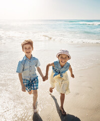 Canvas Print - Beach, smile and portrait of children holding hands on holiday, vacation and tropical adventure. Happy family, summer and young boy and girl by ocean for bonding, playing in waves and fun outdoors