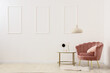 © Pixel-Shot - Beautiful living room with pink armchair, pillow and coffee table
