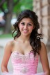© Adriana - Smiling Hispanic teenage girl posing wearing her quinceanera fancy outfit posing for a formal portrait in a beautiful park