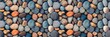 © QLab - Blue tone colorful river stones seamless pattern background.