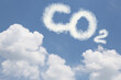 © New Africa - Blue sky with CO2 chemical formula and clouds. Carbon dioxide emissions