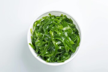 Wall Mural - Top view of isolated Japanese seaweed salad in white bowl