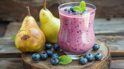 Wall Mural - Blueberry and pear smoothie on a wooden table Promoting healthy eating
