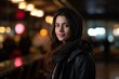 © Stocknterias - Beautiful young woman in a night city, shallow depth of field
