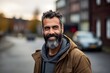© Stocknterias - Portrait of a handsome middle-aged man with beard and mustache on the city street